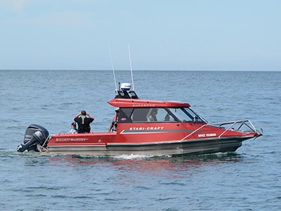 Our red 25-foot tour boat 